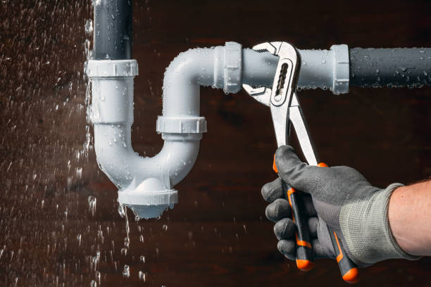 Professional Emergency Plumber technician working in Lima, IL